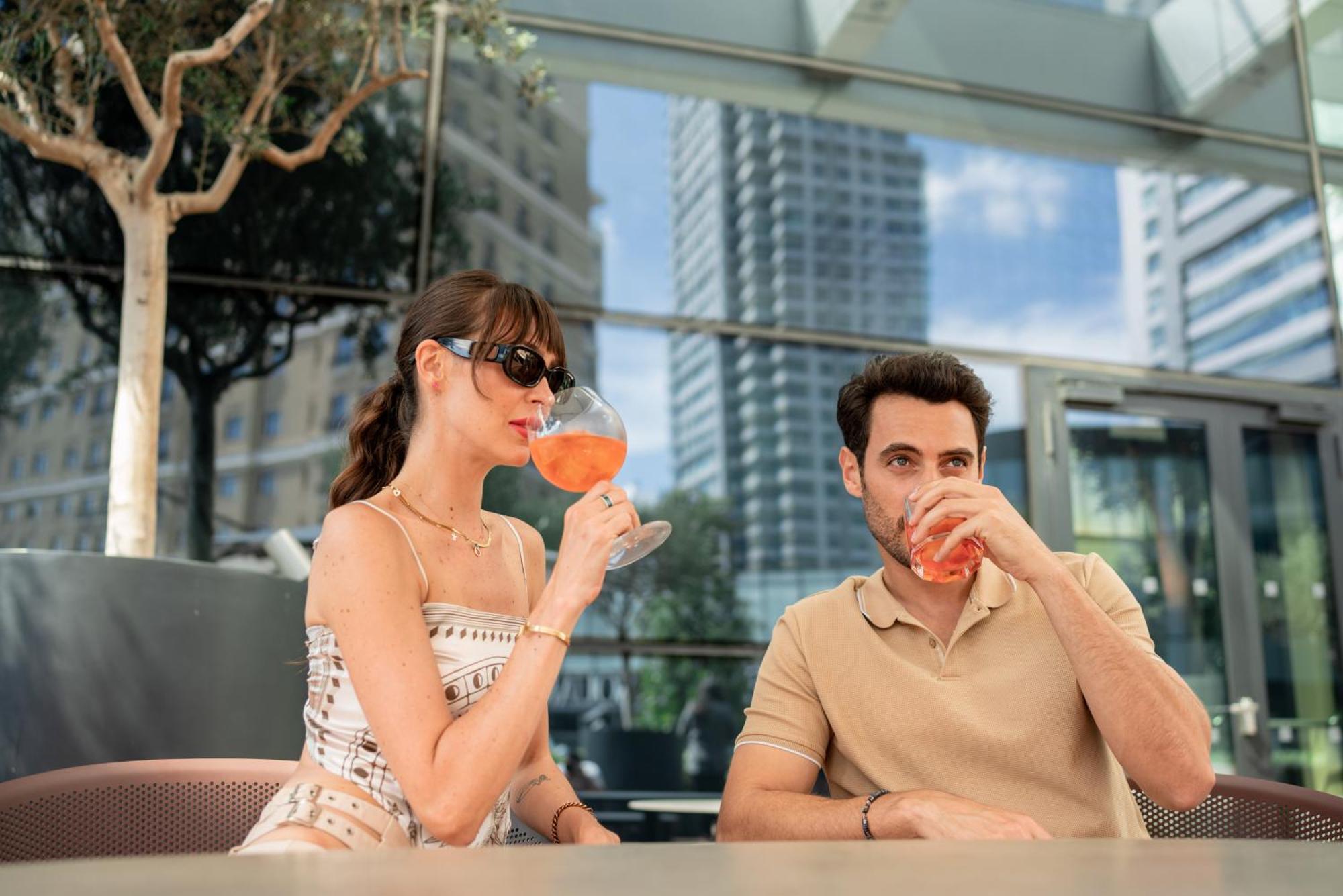 Hotel Address Provincia di Istanbul Esterno foto A couple drinking Aperol Spritz